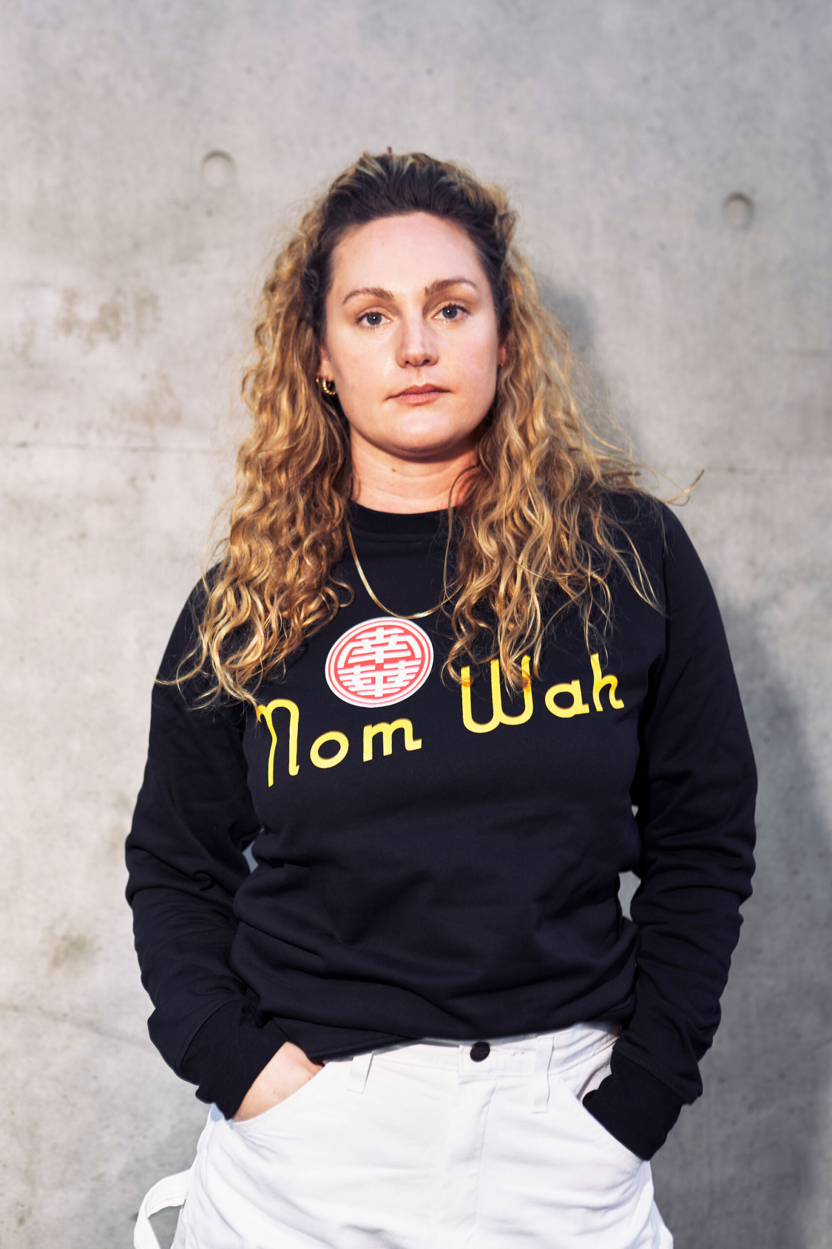 Nom Wah sweatshirt, modeled by Alex Baker
