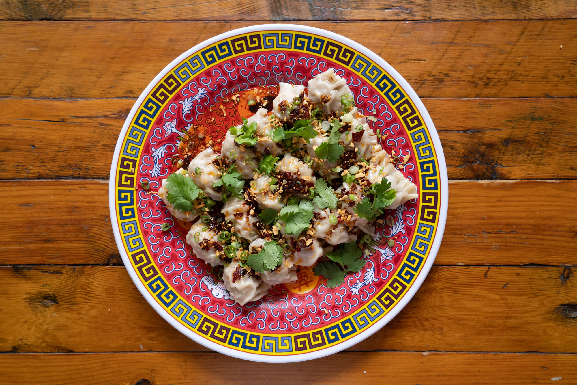 Dumplings, served with red chili oil